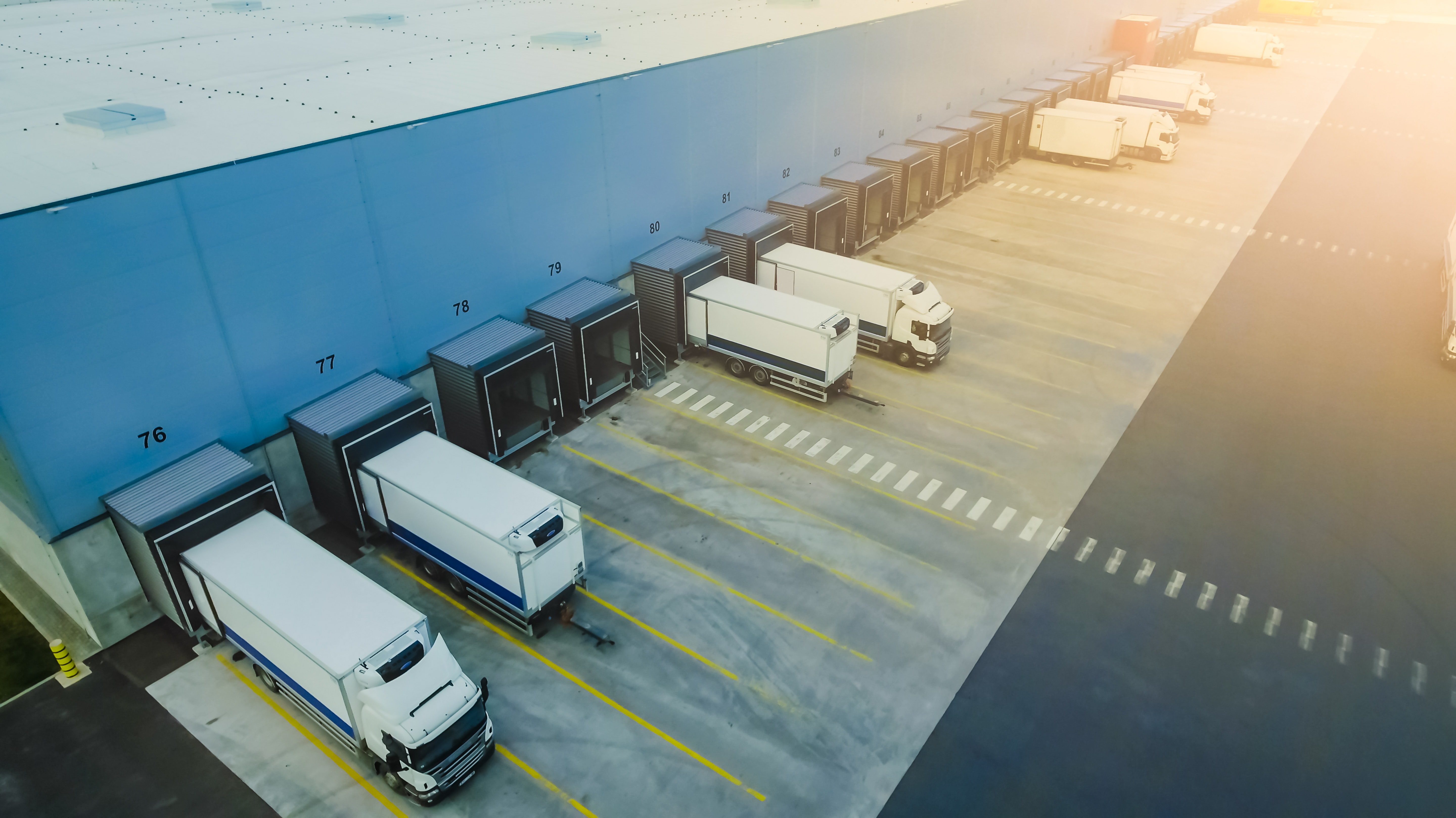 Warehouse dock with trucks